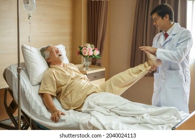 doctor examining the knee and leg  after surgery of asian senior old man patient suffering from pain in knee on bed in medical office room at hospital . diversity  people   - Powered by Shutterstock