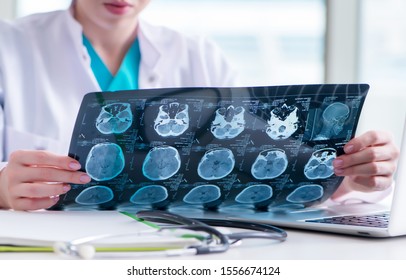 Doctor examining MRI image in hospital