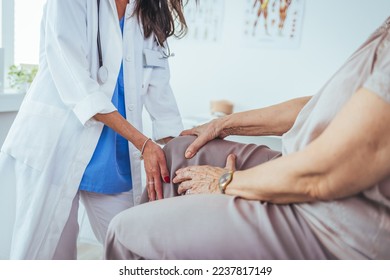 Doctor examining patient knee. Physiotherapist exam patient's knee. Senior patient with knee injury visit his physiotherapist. Doctor the traumatologist examines the patient the patient's ankle leg

 - Powered by Shutterstock