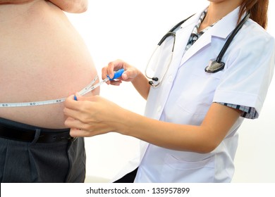 Doctor examining a patient obesity