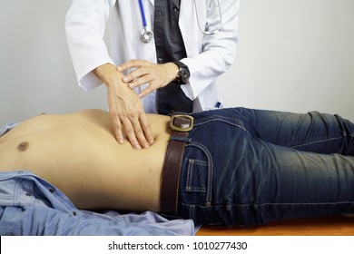 The doctor is examining the patient's stomach, abdominal pain, gastric ulcer, appendicitis.