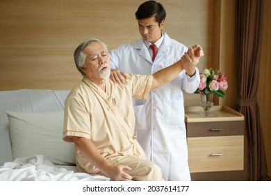 doctor examining the shoulder and arm after surgery of asian senior old man patient suffering from pain in knee on bed in medical office room at hospital . diversity  people   - Powered by Shutterstock