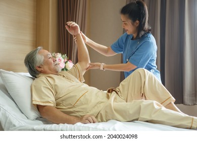 doctor examining the shoulder and arm after surgery of asian senior old man patient suffering from pain in knee on bed in medical office room at hospital . diversity  people   - Powered by Shutterstock