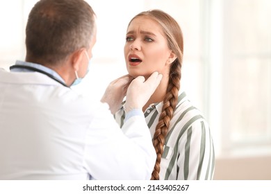 Doctor Examining Woman Sore Throat Clinic Stock Photo 2143405267 ...