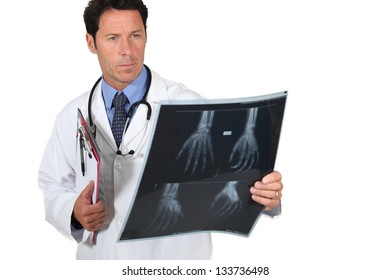 Doctor examining x-ray image
