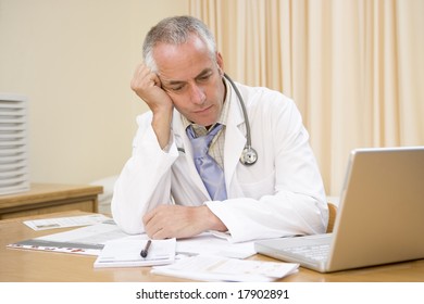 Doctor Exhausted Desk Stock Photo 17902891 | Shutterstock