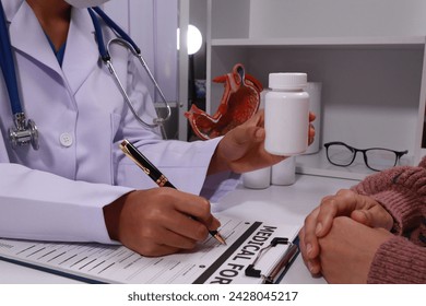 The doctor explained gastritis using a model. Treatment options were discussed. Understanding the condition better helps in managing it effectively.