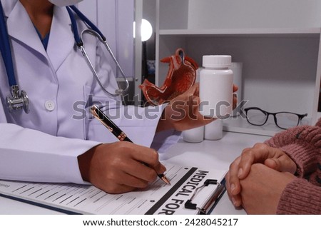 The doctor explained gastritis using a model. Treatment options were discussed. Understanding the condition better helps in managing it effectively.