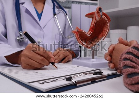 The doctor explained gastritis using a model. Treatment options were discussed. Understanding the condition better helps in managing it effectively.