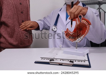 The doctor explained gastritis using a model. Treatment options were discussed. Understanding the condition better helps in managing it effectively.