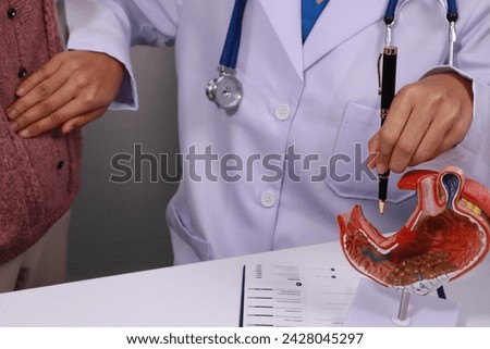 The doctor explained gastritis using a model. Treatment options were discussed. Understanding the condition better helps in managing it effectively.