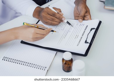 The doctor explained the patient's symptom and how to treat and care in detail to the patient. including drugs used to treat diseases drug side effect. - Powered by Shutterstock