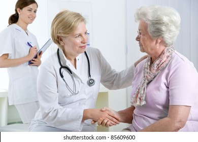 doctor explaining diagnosis to his female patient - Powered by Shutterstock