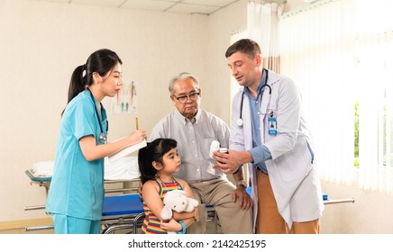 Doctor And Family Wear Face Mask In Hospital Protect From COVID-19. People Health Care And Medicine Concept.