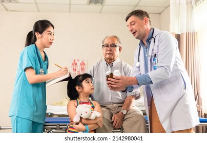 Doctor And Family Wear Face Mask In Hospital Protect From COVID-19. People Health Care And Medicine Concept.