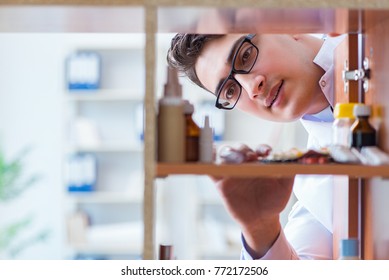 Doctor At Farmacy Retail Shop Looking For Medicines