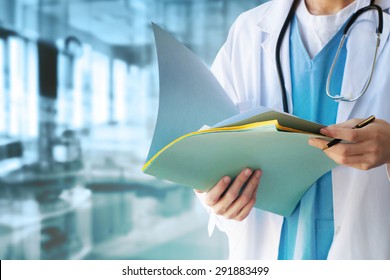 Doctor with files