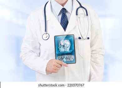 Doctor With FMRI Scan On Tablet Screen