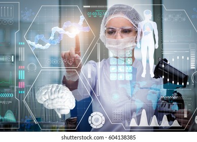 Doctor in futuristic medical concept pressing button