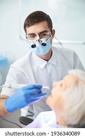 Doctor Getting Dental Drill Closer To Patient Teeth