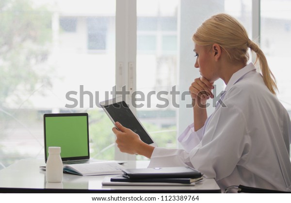 Doctor Girl Who Working Front Desk Royalty Free Stock Image
