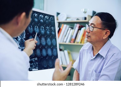 Doctor Give Advice To Elderly Patient About MRI (Xray) Brain Scans 