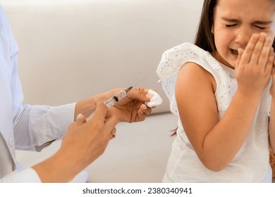 Doctor giving injection to little girl in hospital, closeup. Scared Child's Vaccine Fear at Pediatric Clinic, Continuous Sketch Doctor Giving Flu Shot to Terrified Kid, Scared Little Girl  - Powered by Shutterstock