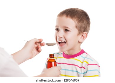 Doctor Hand Giving Spoon Dose Of Medicine Liquid Drinking Syrup To Child Boy Patient