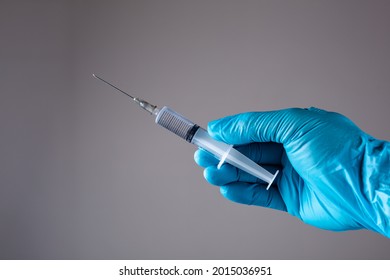 doctor hand holding a syringe, medicine concept. vaccine covid-19 concept.  - Shutterstock ID 2015036951