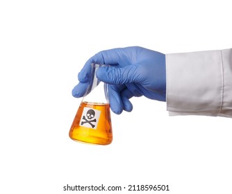 Doctor hand holds retort with toxic orange liquid - isolated photo on a white background. Death symbol on a glass container. Chemical flask with yellow poison in a scientist hand. Blue nitrile glove - Shutterstock ID 2118596501