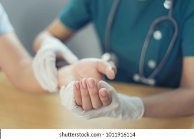 Doctor Hand Physicist Physical Therapy Treatment Patient In The Clinic.Orthopedic Medical Exam In Doctor's Hospital Office Partnership, Traumatology And Medical Consultation For Hand Wrist Injury