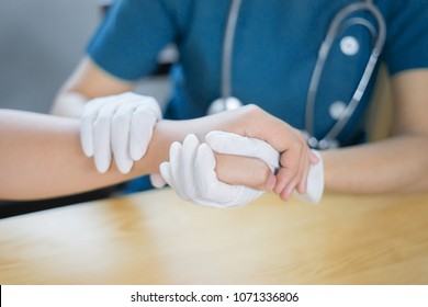 Doctor Hand Physicist Physical Therapy Treatment Patient In The Clinic.Orthopedic Medical Exam In Doctor's Hospital Office Partnership, Traumatology And Medical Consultation For Hand Wrist Injury