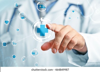 Doctor Hand Pushing Button On Virtual Screen. Medical Technology Concept