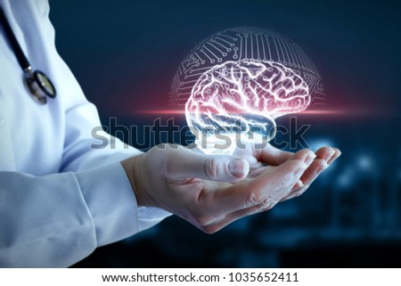 Doctor hand shows the scanning of the brain on a blue background.