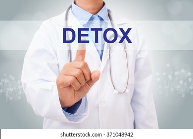 Doctor hand touching detox sign on virtual screen. medical concept