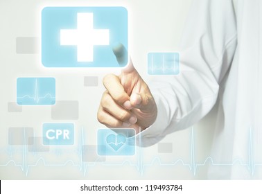 Doctor hand touching first aid sign on virtual screen - Powered by Shutterstock