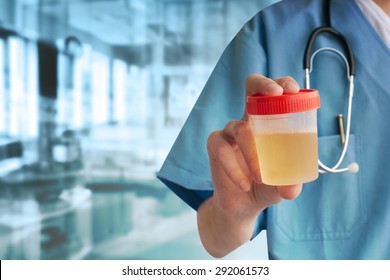 Doctor hand with urine container