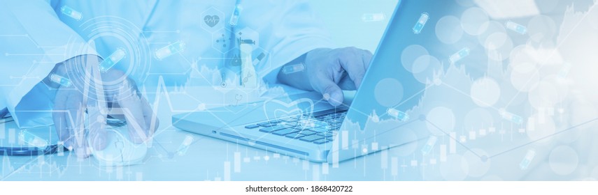 Doctor hand working with laptop computer,concept online marketing business of medical,healthcare,insurance with stock graph and diagram,medical examination analysis report,banner panoramic header - Powered by Shutterstock