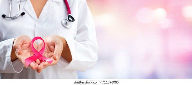 Doctor Hands Holding Pink Cancer Awareness Ribbon
 - Shutterstock ID 711596005