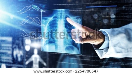 Doctor, healthcare or finger on xray hologram in tuberculosis virus, cancer analytics or asthma x ray at night. Futuristic, abstract or medical lungs scan for surgery planning or hospital woman help