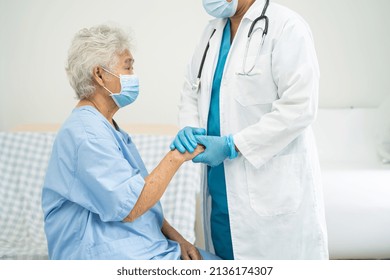 Doctor Help Asian Senior Or Elderly Old Lady Woman Patient Wearing A Face Mask In Hospital For Protect Safety Infection And Kill Covid 19 Coronavirus.19 Coronavirus.