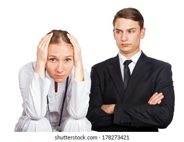 Doctor And Her Lawyer At A Meeting For Malpractice