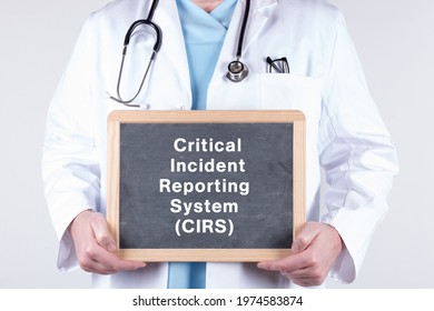 A Doctor Holding A Blackboard With Critical Incident Reporting System (CIRS) Text