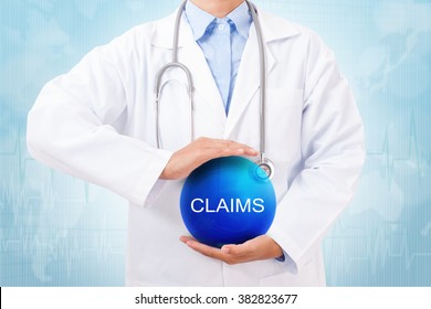 Doctor Holding Blue Crystal Ball With Claims Sign On Medical Background.