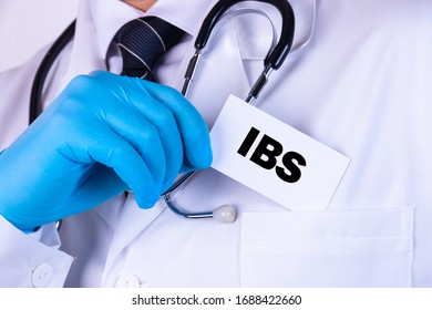 Doctor Holding A Card With Text IBS Medical Concept