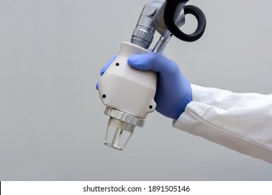 Doctor Holding CO2 Fractional Laser Hand Piece - Shutterstock ID 1891505146