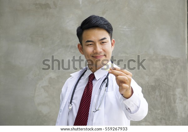 Doctor Is Holding Condom For Safe Sex Concept A Condom Is A Sheath