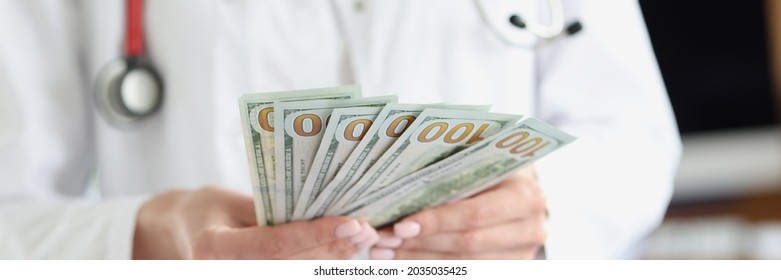 Doctor Holding Dollar Bills His Hands Stock Photo 2035035425 | Shutterstock