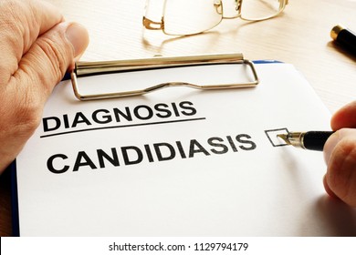 Doctor Is Holding Form With Candidiasis.