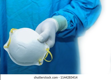 Doctor Holding N95 Mask On White Background